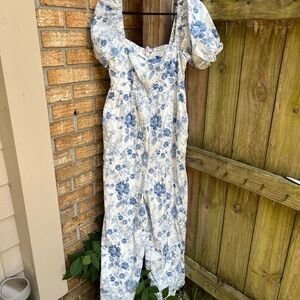 Francesca's Collections Blue and White Floral Jumpsuit with Puff Sleeves